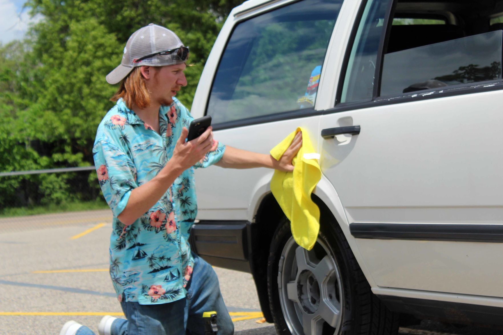 Phil waxes car